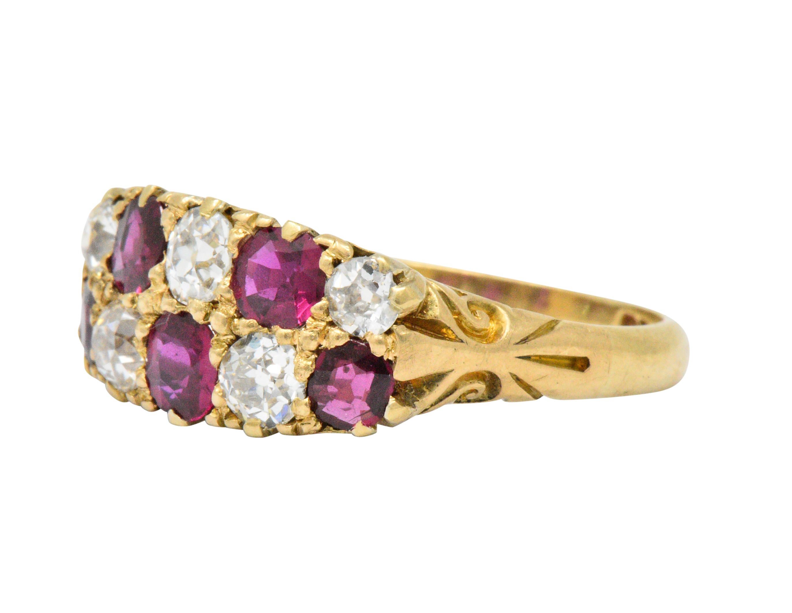 Set to the front with 5 rubies weighing approximately 1.25 carats, bright very slightly 
purplish red to red, and old mine cut diamonds weighing approximately 0.80 CTW, GHI color and VS to SI clarity

Two rows of staggered diamonds and