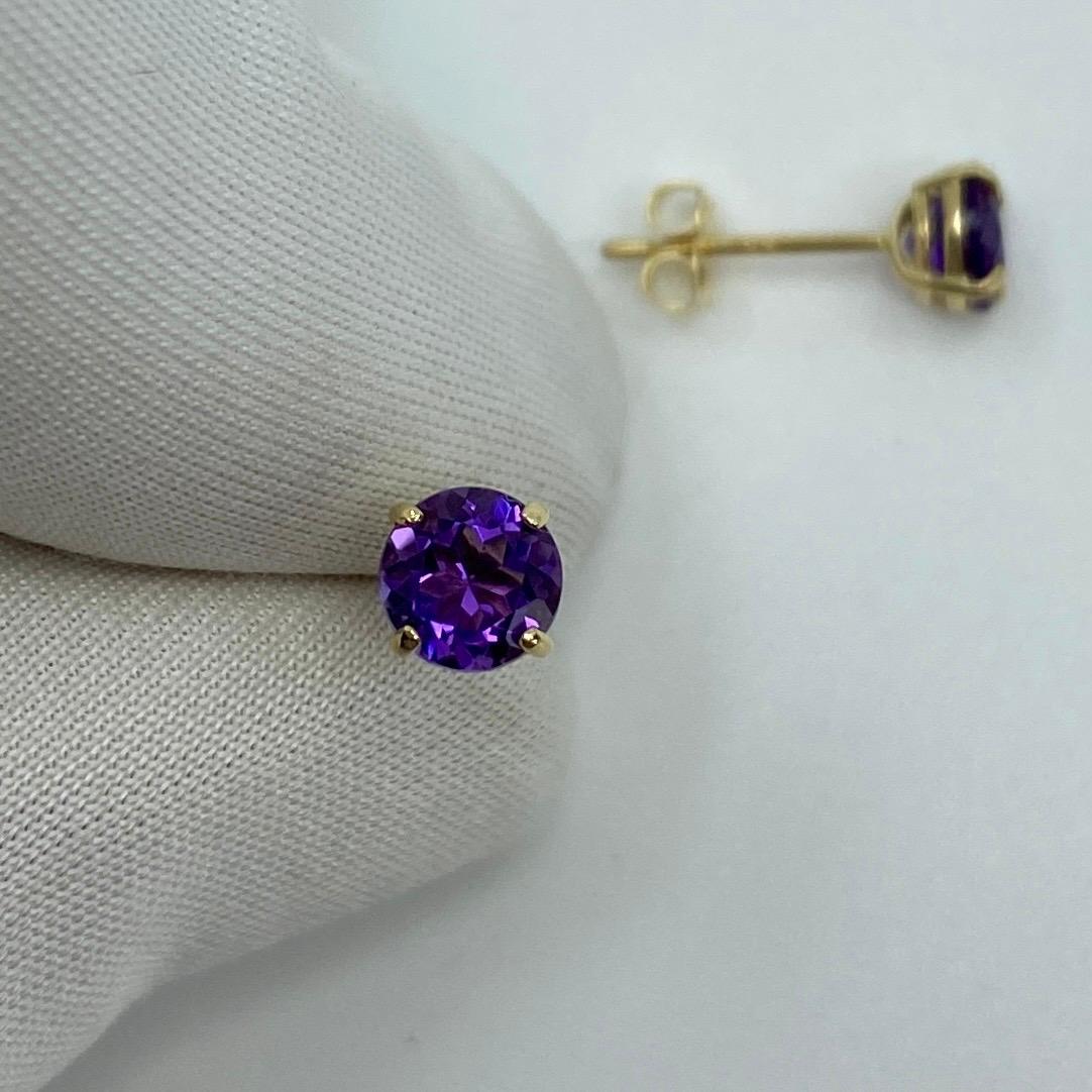 Vivid Deep Purple Amethyst Yellow Gold Earring Studs.

Beautiful 5mm matching pair of round Amethysts with a vivid deep purple colour, excellent clarity and an excellent round brilliant cut.

Set in lightweight 9k yellow gold suds with butterfly