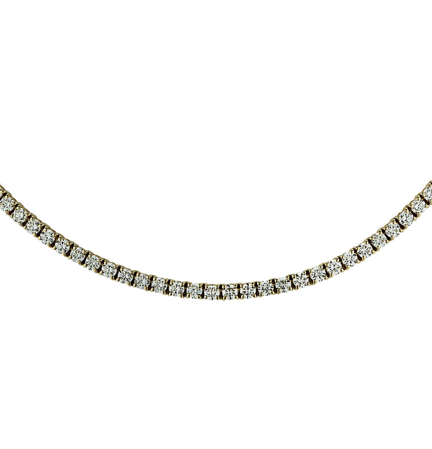Exquisite Vivid Diamonds Straight Line diamond tennis necklace crafted in Yellow Gold, showcasing 130 round brilliant cut diamonds weighing 10.07 carats total, G color, VS Clarity. Each diamond was carefully selected, perfectly matched and set in a