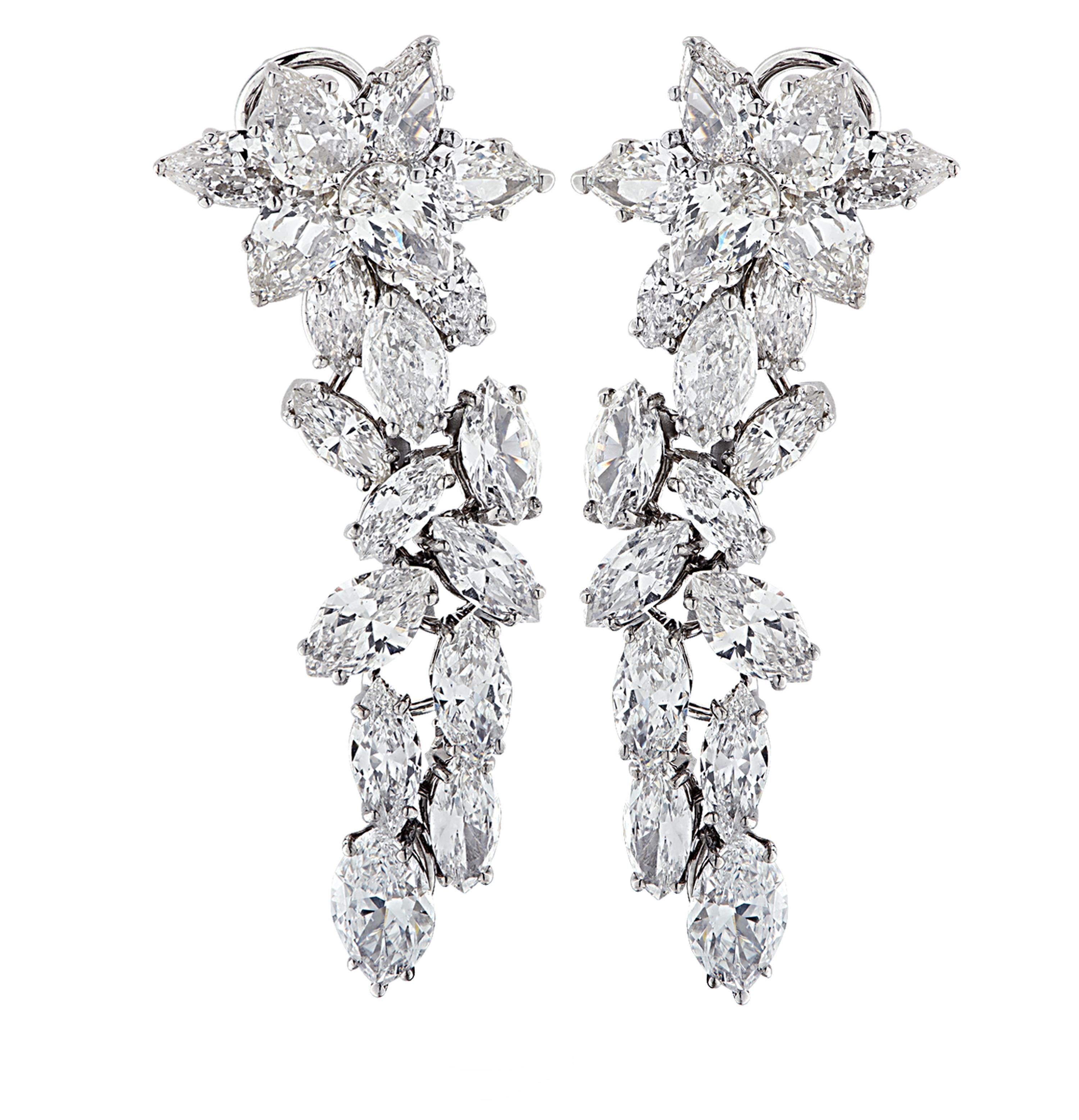 Sensational Vivid Diamonds Dangle earrings, finely crafted by hand in 18 karat white gold, showcasing 36 stunning carefully selected and perfectly matched pear shape and marquise cut diamonds weighing approximately 14 carats total, G color, SI