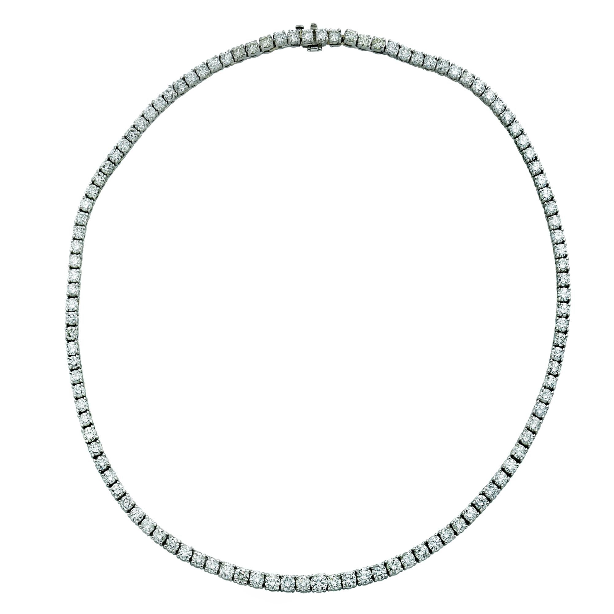 Exquisite Vivid Diamonds Straight Line diamond tennis necklace crafted in 18 karat White Gold, showcasing 106 round brilliant cut diamonds weighing 14.61 carats, E-F color, VS Clarity. Each diamond was carefully selected, perfectly matched and set