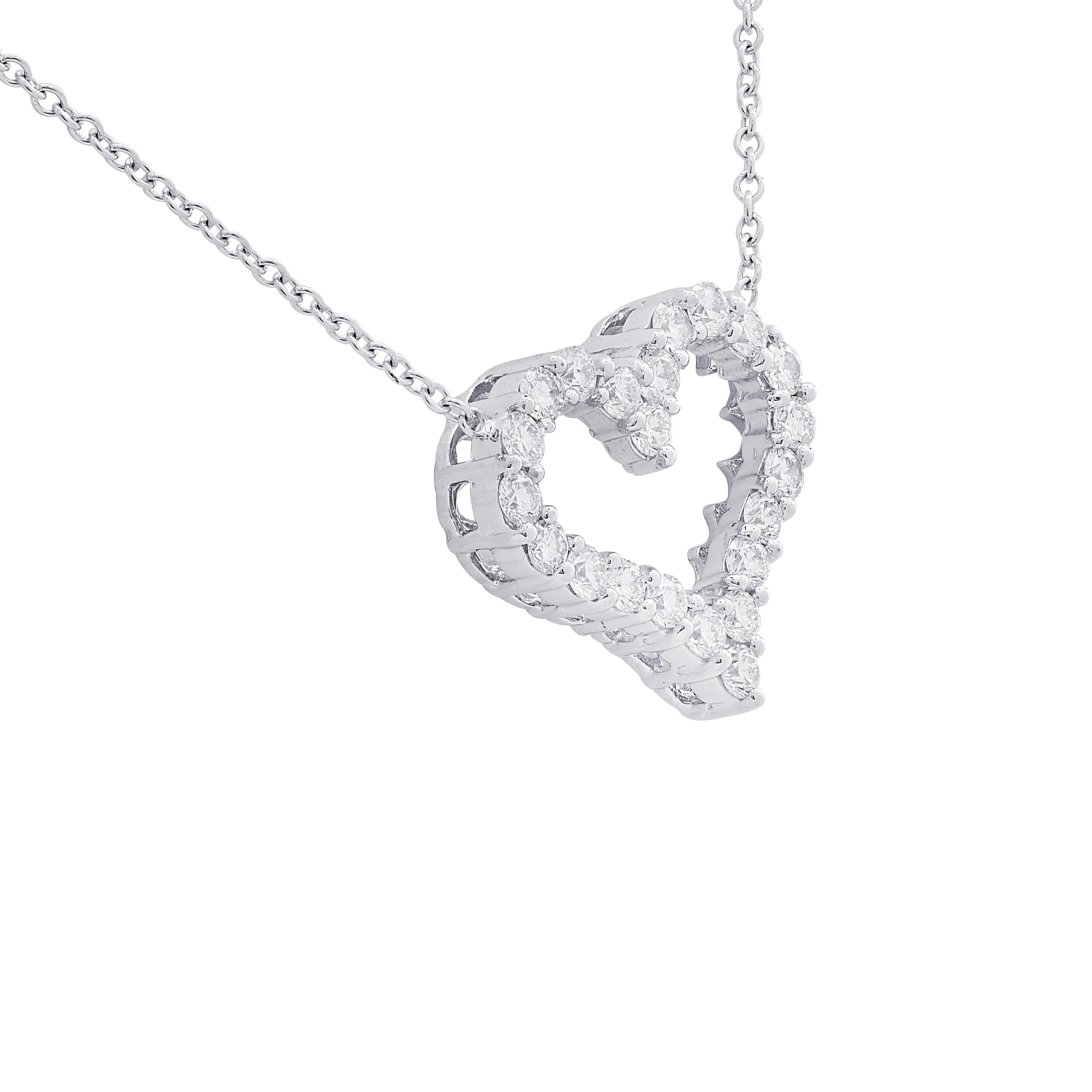 Enchanting Vivid Diamonds heart necklace crafted in 18 karat white gold featuring 22 round brilliant cut diamonds weighing approximately 1.5 carats total, G color, VS-SI clarity arranged in a delightful open heart design. This stunning necklace