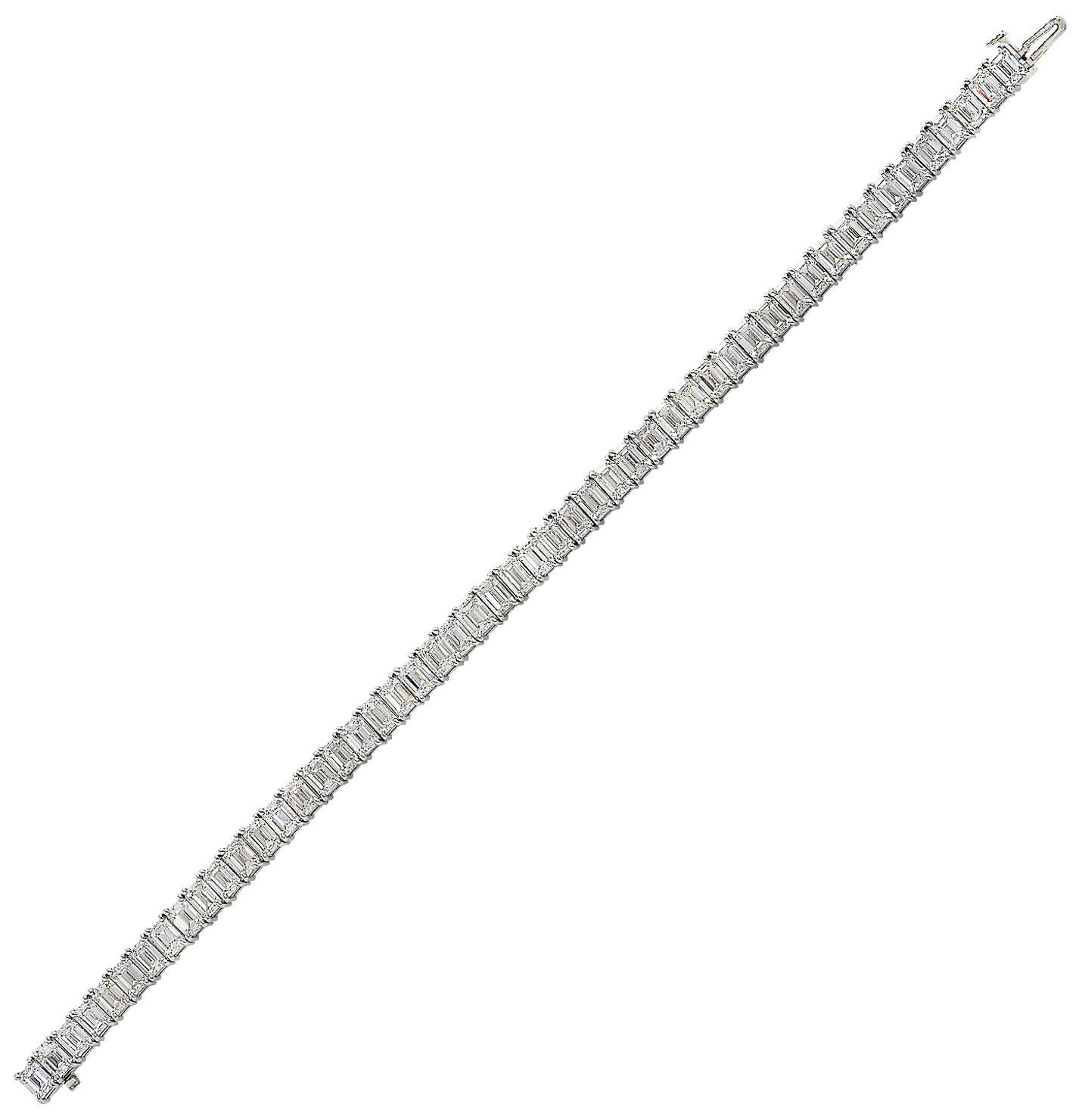 Exquisite Vivid Diamonds tennis bracelet crafted in platinum, showcasing 51 emerald cut diamonds weighing 15.81 carats total, D-F color, VVS-VS clarity. Each diamond is carefully selected, perfectly matched and set in a seamless sea of eternity,
