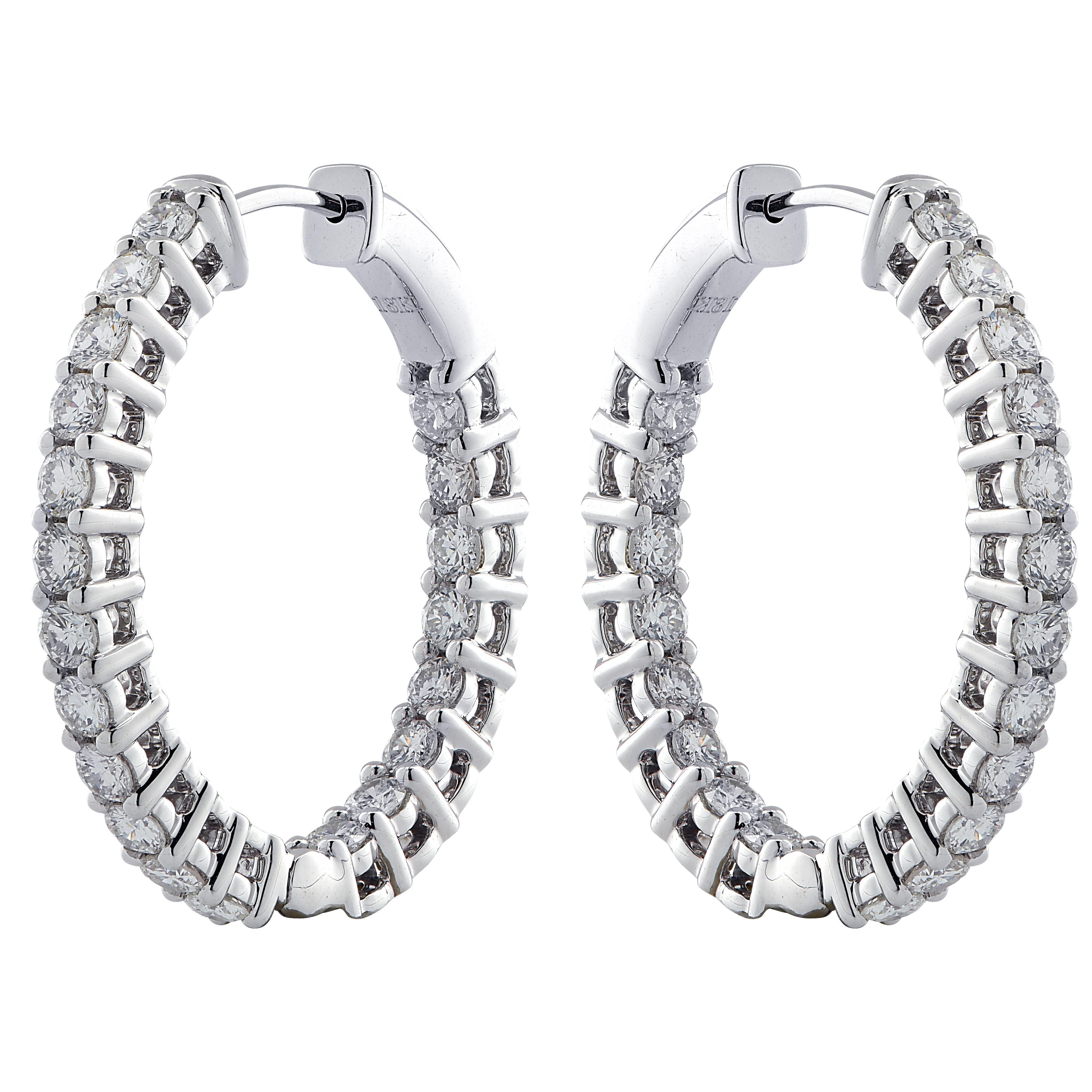 Spectacular Vivid Diamonds In/Out diamond hoop earrings crafted in 18 karat white gold showcasing 40 round brilliant cut diamonds weighing 2.32 carats total, G-H color, VS-SI clarity. Each diamond is carefully selected, perfectly matched and set on