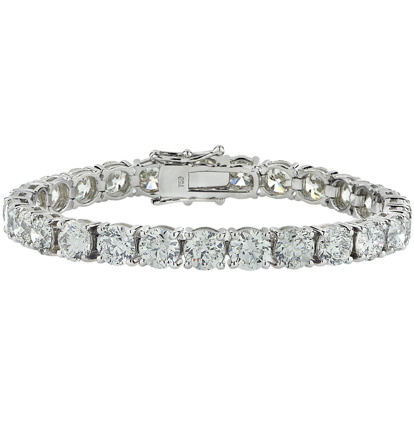 Spectacular bracelet hand crafted in 18k white gold, featuring 27 sensational round brilliant cut diamonds weighing 24.75 carats total, H-J color, SI1-I1 clarity. Each diamond was carefully selected, perfectly matched and set in an endless sea of