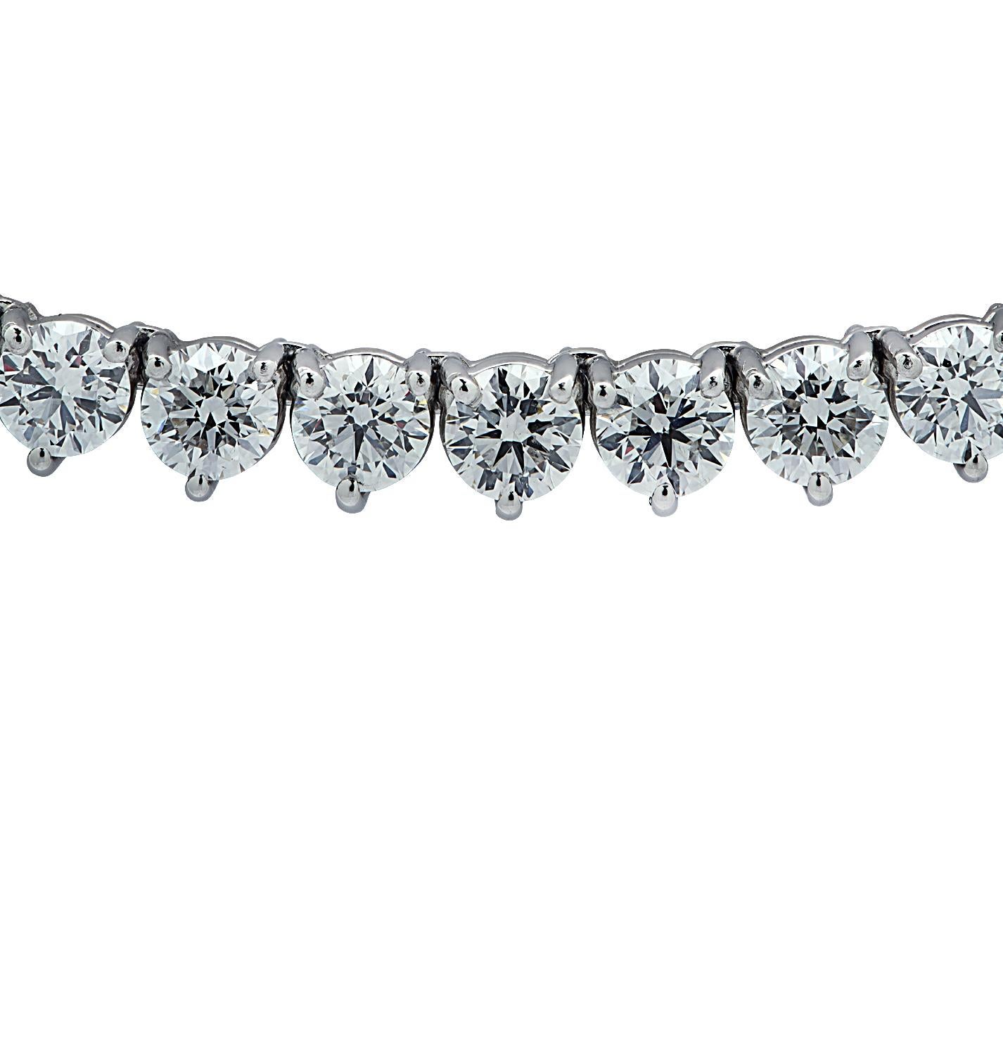 Exquisite Vivid Diamonds Straight Line diamond tennis necklace crafted in Platinum, showcasing 94 round brilliant cut diamonds weighing 25.39 carats, D color, VS-SI Clarity. Each diamond was carefully selected, perfectly matched and set in a