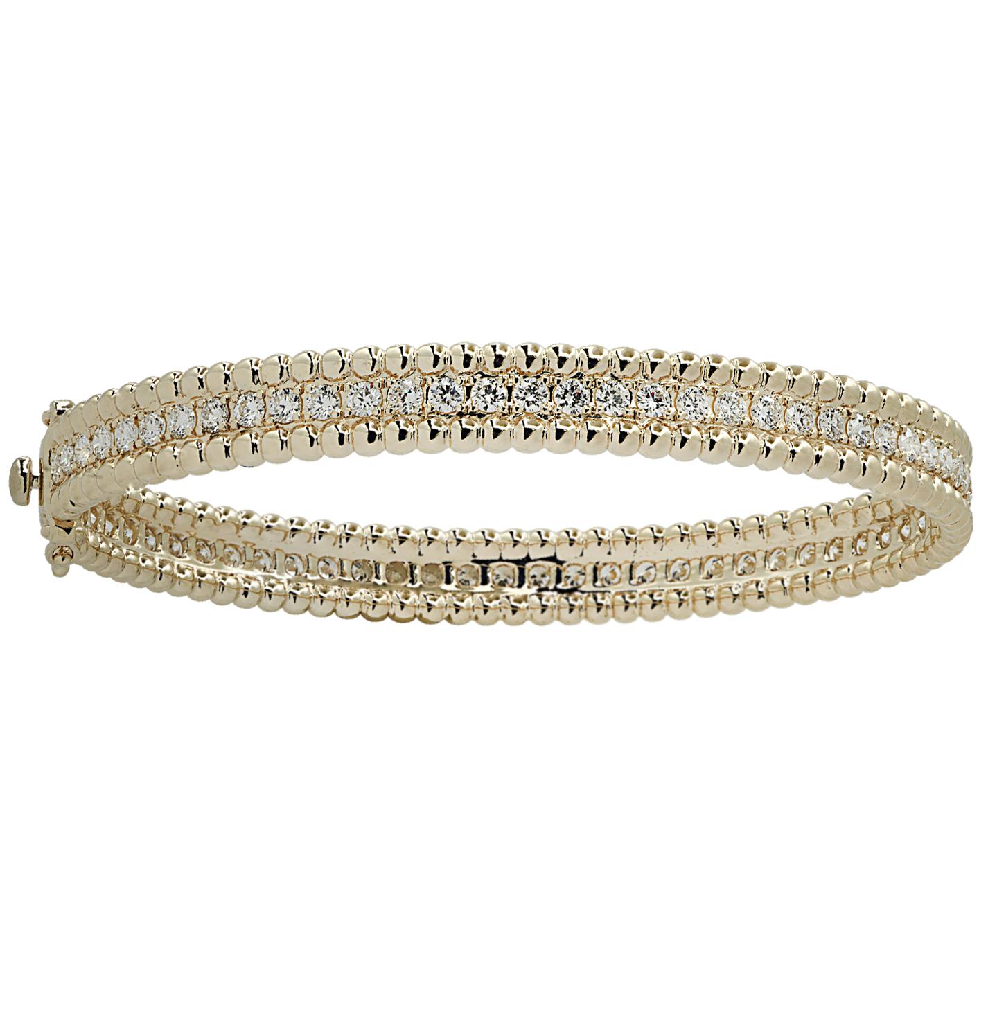 Stunning Vivid Diamonds Bangle Bracelet crafted in yellow gold, featuring 64 round brilliant cut diamonds weighing 2.75 carats total, F color, VS-SI clarity. This spectacular bangle is set with a row of diamonds, laced with gold beads creating a