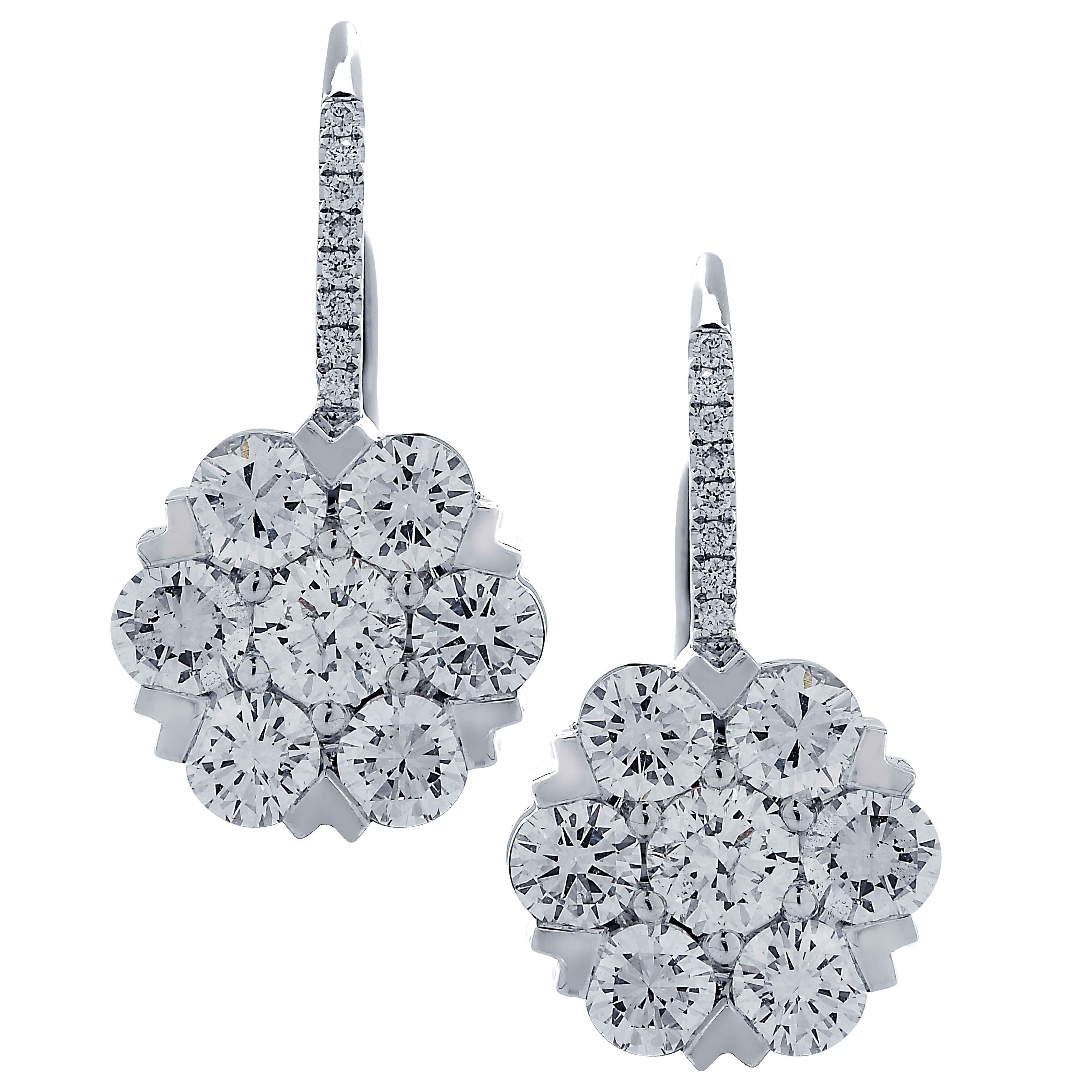 Spectacular Vivid Diamonds dangle earrings finely crafted in 18 karat white gold featuring 30 round brilliant cut diamonds weighing 2.87 carats total G color VS-SI clarity arranged in a mesmerizing flower design that captures the unparalleled beauty