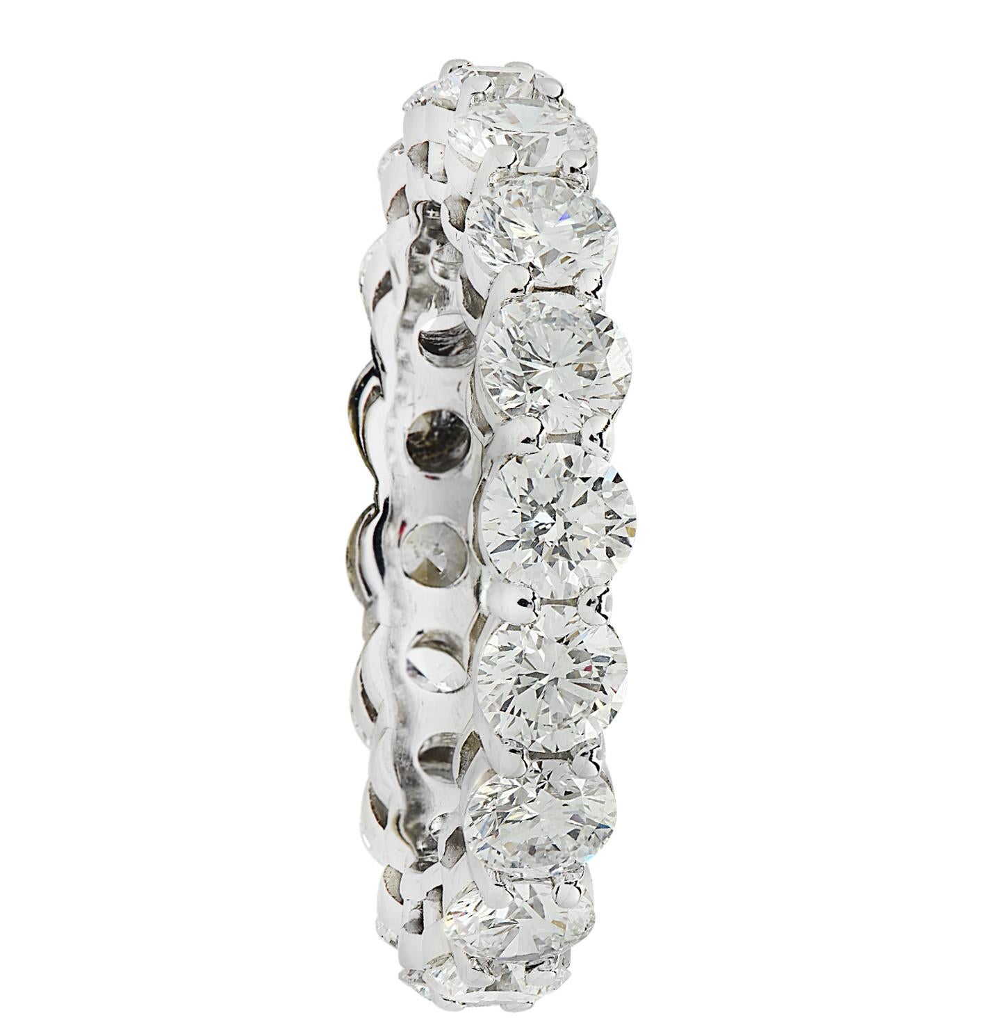 Exquisite eternity band crafted in Platinum, showcasing 18 stunning round brilliant cut diamonds weighing approximately 3 carats total, F color, VS clarity. Each diamond was carefully selected, perfectly matched and set in a seamless sea of