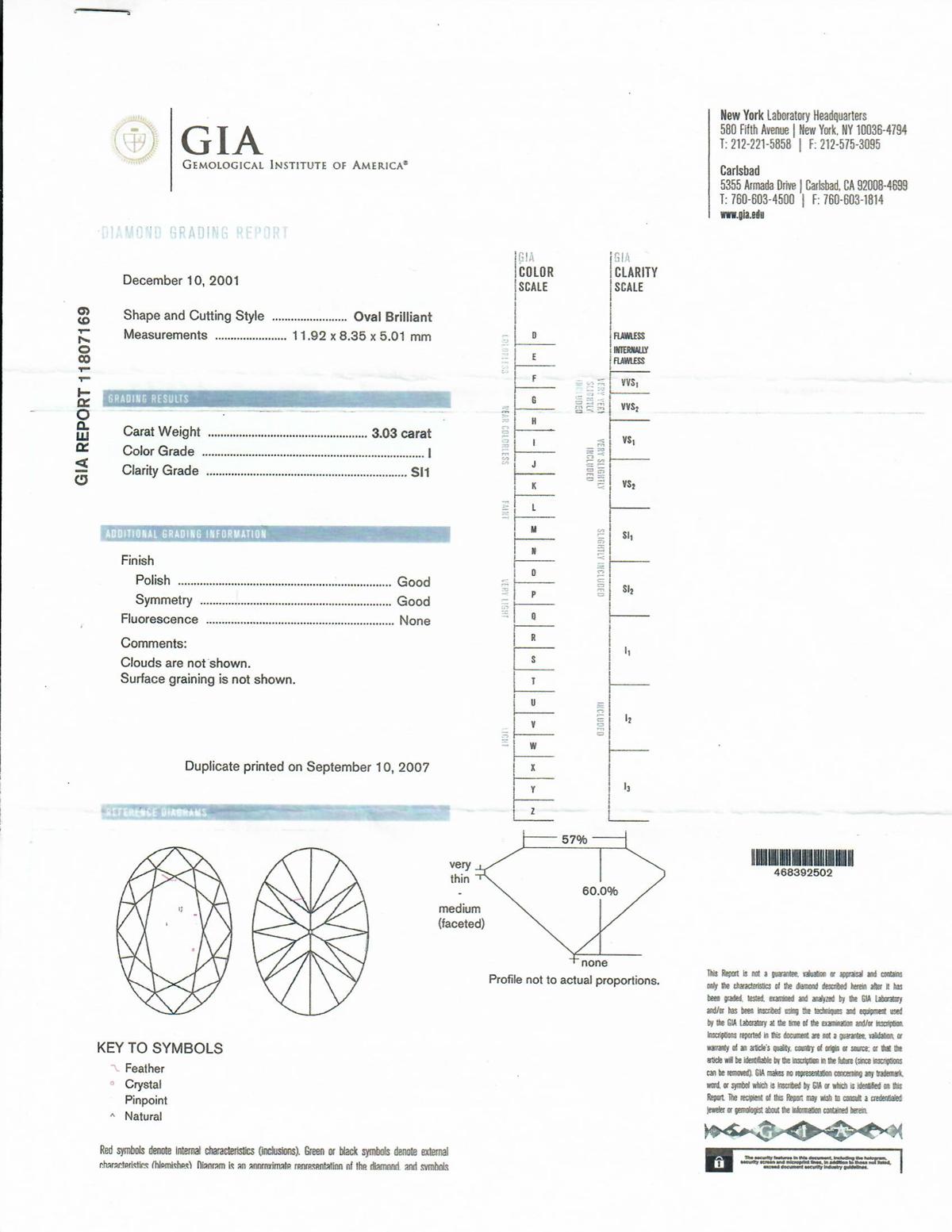 Exquisite Vivid Diamonds engagement ring finely crafted by hand in platinum showcasing a GIA Certified 3.01 carat oval cut diamond, I color, SI1 clarity, seamlessly set with 2 carefully selected and perfectly matched half moon cut diamonds weighing