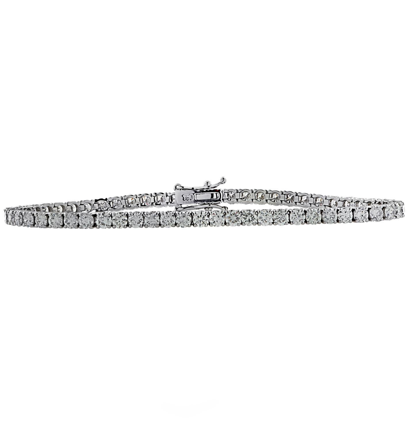 Spectacular Vivid Diamonds diamond tennis bracelet crafted in 18 karat white gold, showcasing 69 stunning round brilliant cut diamonds weighing approximately 3.08 carats total, G-H color, VS-SI clarity. Each diamond is carefully selected, perfectly