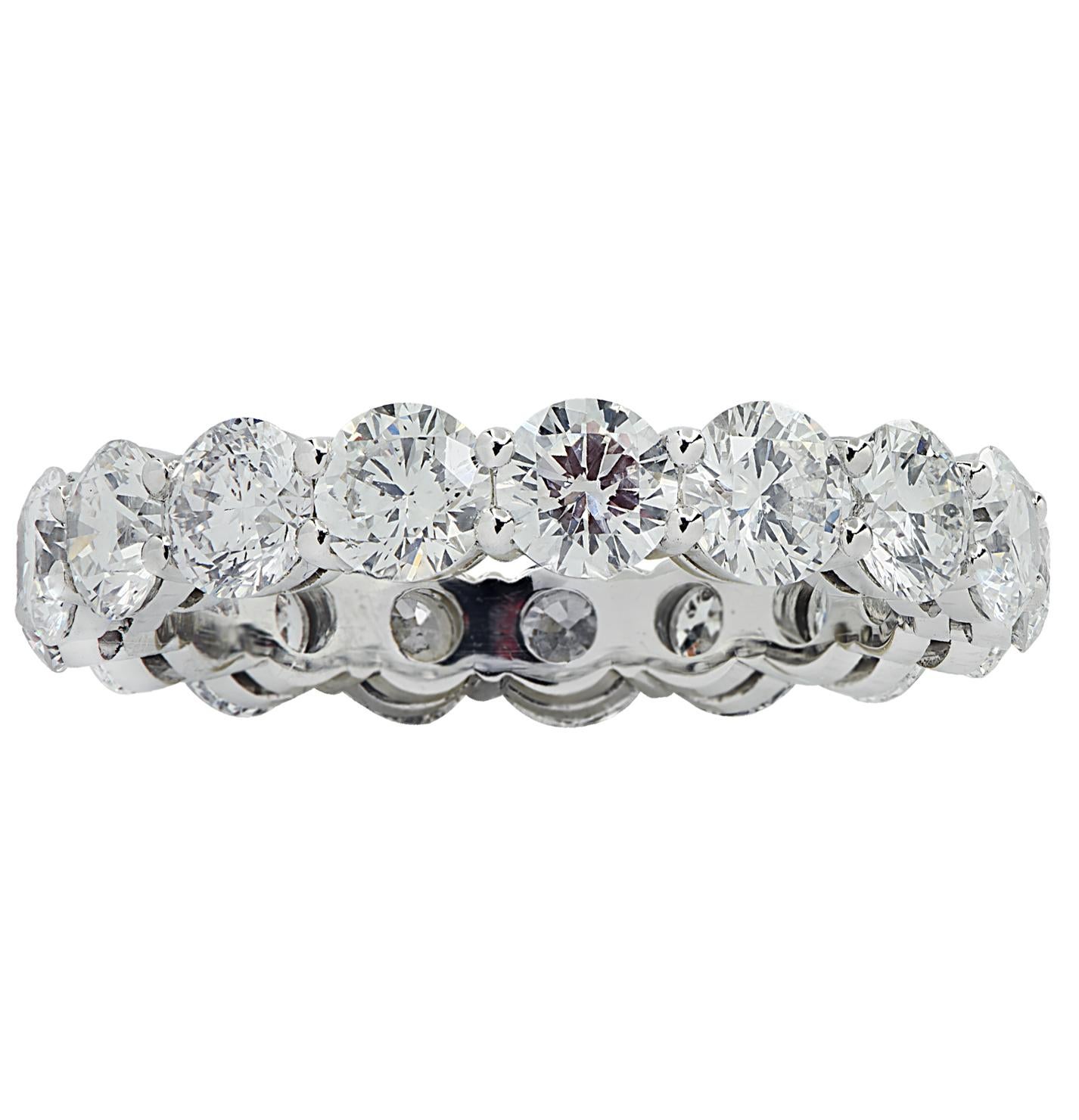 Exquisite Vivid Diamonds eternity band crafted by hand in Platinum, showcasing 17 stunning round brilliant cut diamonds weighing 3.12 carats total,  D-F color, VS-SI clarity. Each diamond was carefully selected, perfectly matched and set in a