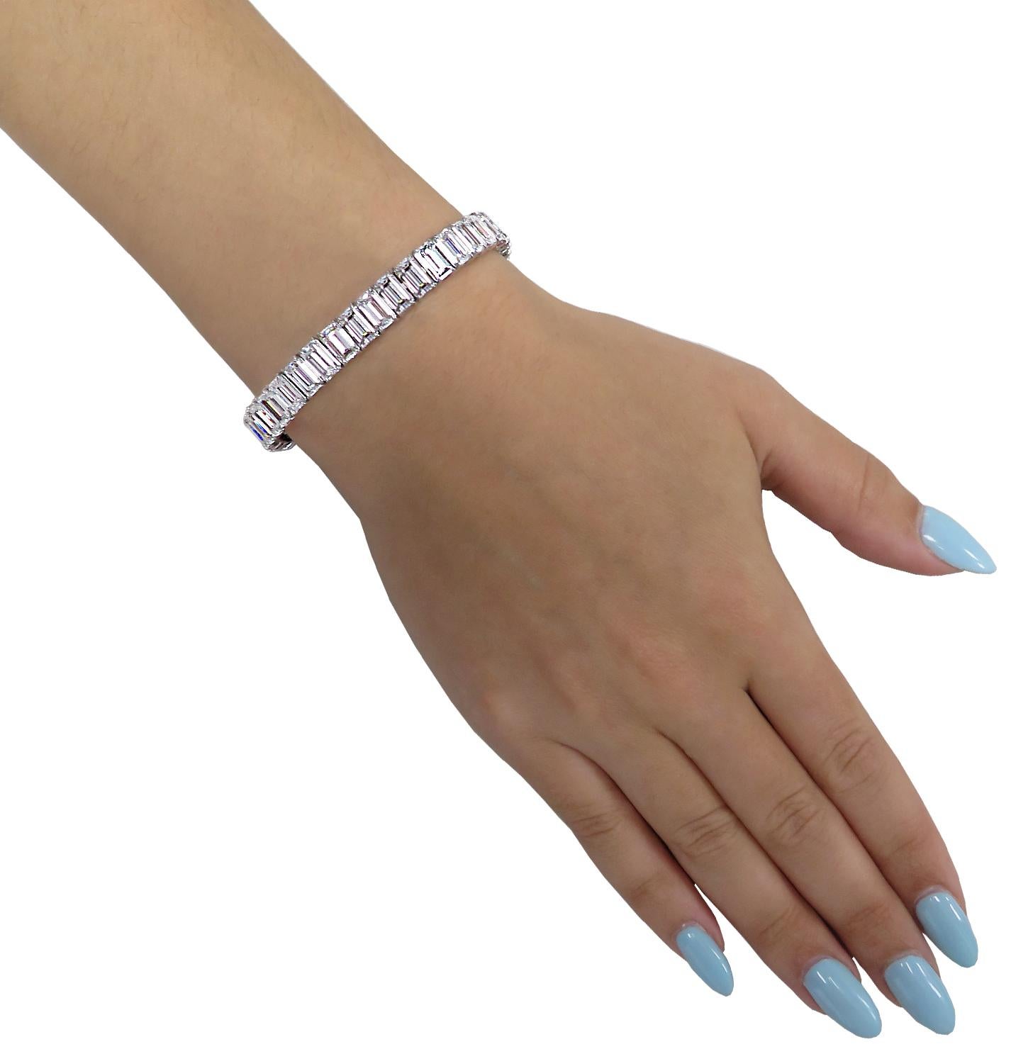 Scintillating Vivid Diamonds Emerald Cut diamond bracelet expertly crafted in platinum, showcasing 40 spectacular GIA Certified emerald cut diamonds weighing 32.10 carats total, D-H color, IF-VS2 clarity. Each diamond was carefully selected,