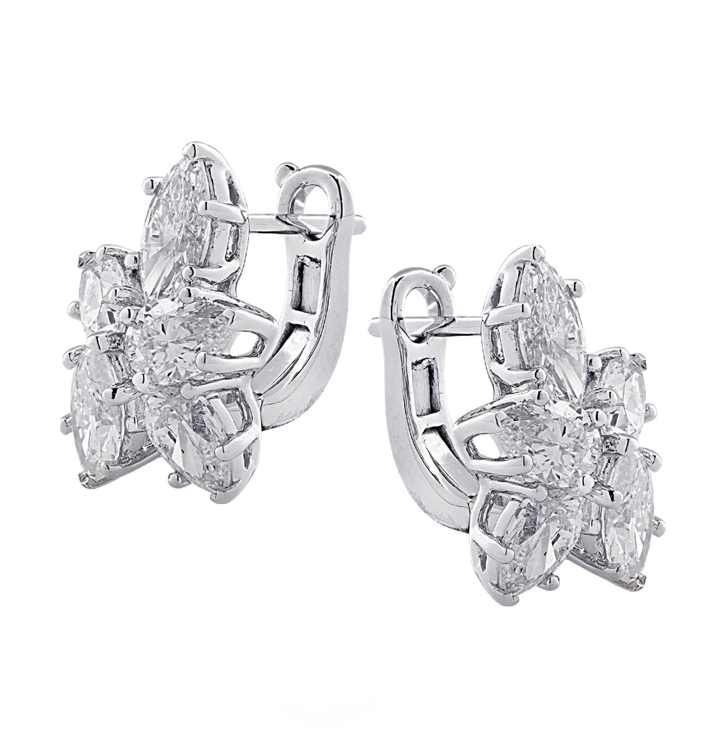 Spectacular Vivid Diamonds earrings crafted in 18 karat white gold showcasing 6 pear shape diamonds weighing 1.85 carats total, G-H color, VS-SI clarity and 4 marquise cut diamonds weighing 1.79 carats total, G-H color, VS-SI clarity. The diamonds