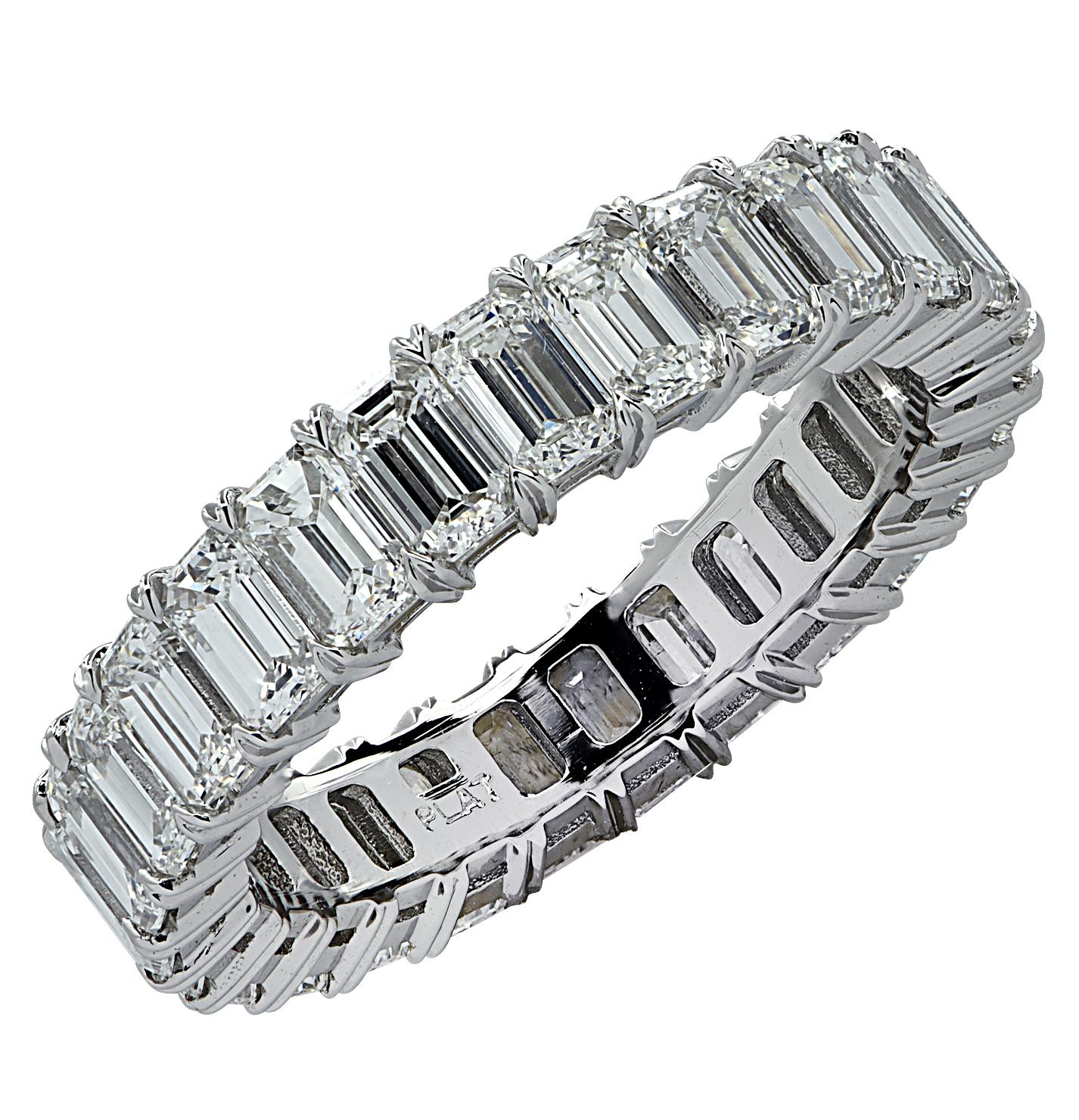 Exquisite Vivid Diamonds eternity band crafted by hand in Platinum, showcasing 27 stunning emerald cut diamonds weighing 3.88 carats total, E-F color, VS clarity. Each diamond is carefully selected, perfectly matched and set in a seamless sea of