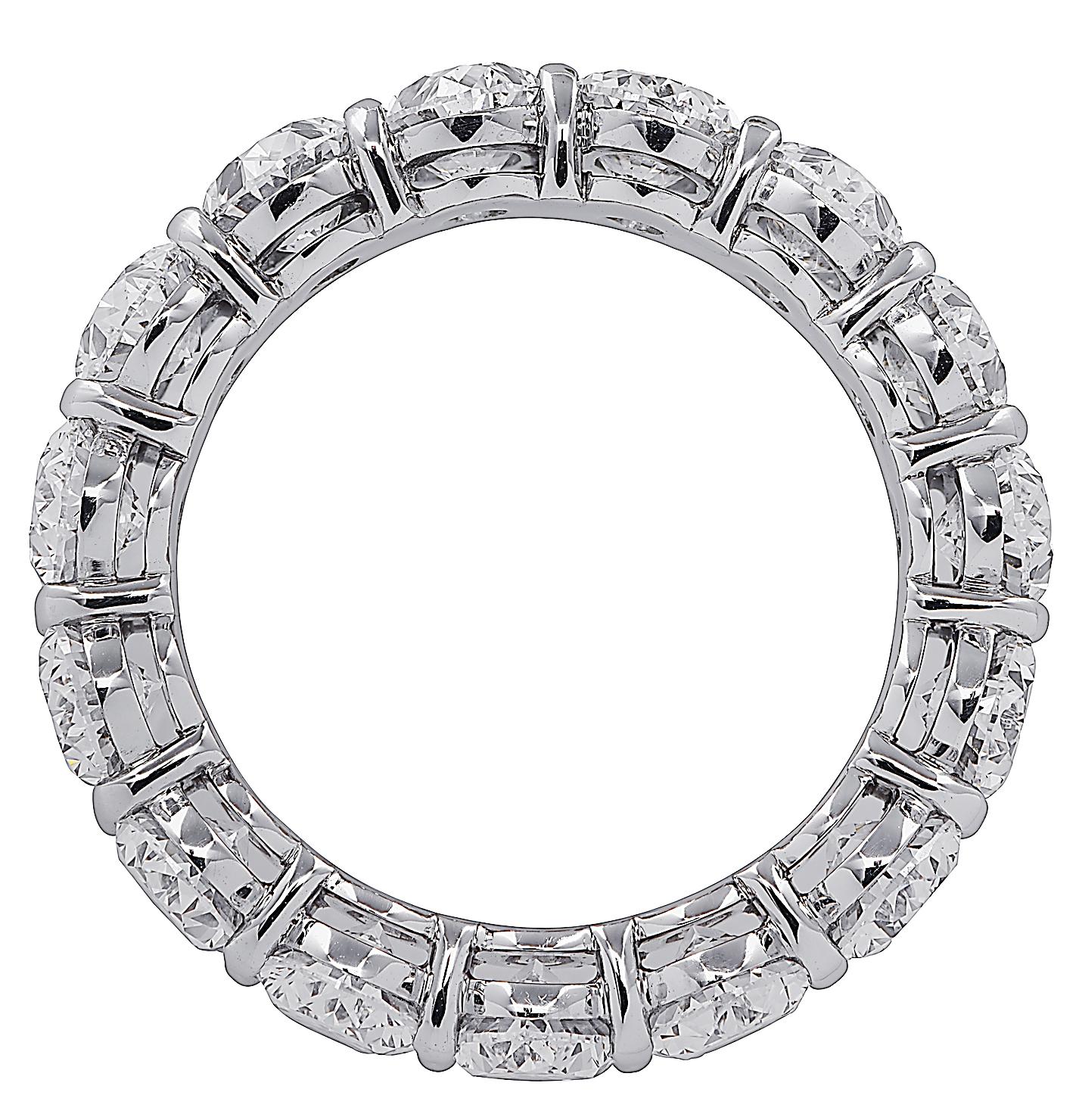Exquisite Vivid Diamonds eternity band crafted in Platinum, showcasing 18 stunning oval cut diamonds weighing 3.9 carats total, E-F color, VVS-VS clarity. Each diamond is carefully selected, perfectly matched and set in a seamless sea of eternity,