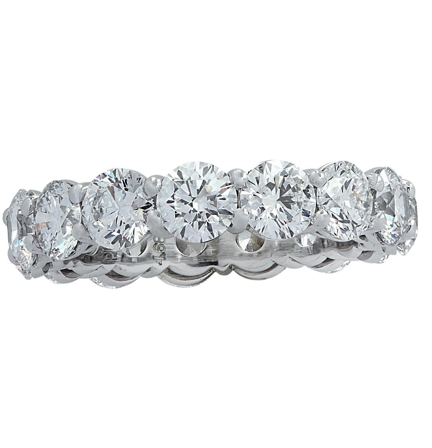 Exquisite Vivid Diamonds eternity band crafted in Platinum, showcasing 16 stunning round brilliant cut diamonds weighing 4.04 carats total, F color, VS-SI clarity. Each diamond was carefully selected, perfectly matched and set in a seamless sea of