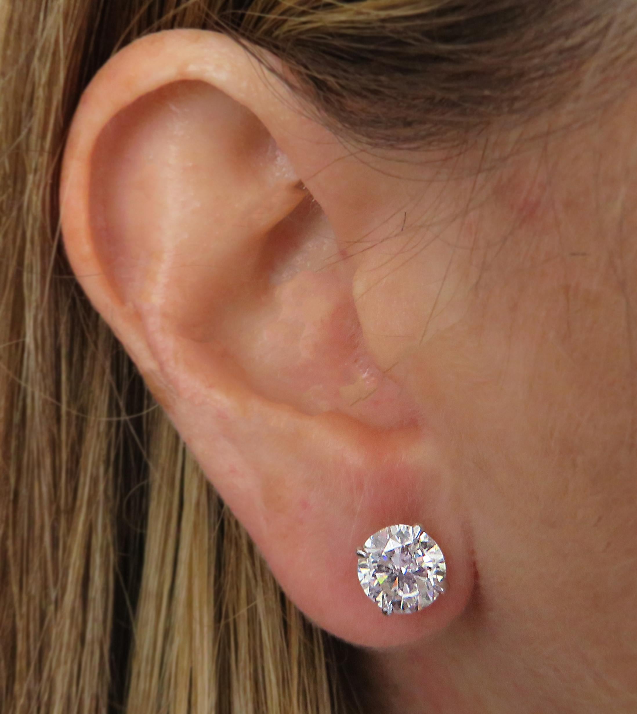Modern Vivid Diamonds 4.04 Carat Diamond Solitaire Stud Earrings