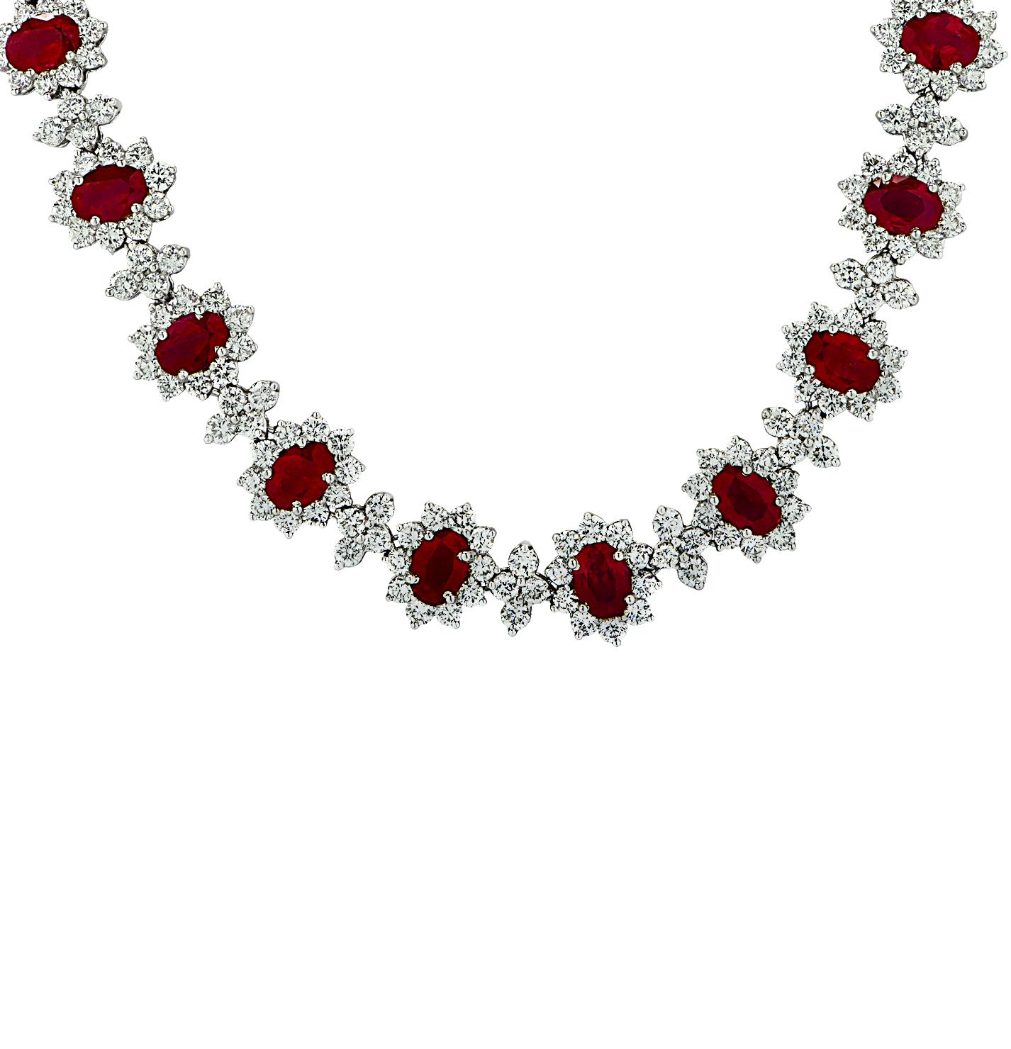 Sensational Diamond and Ruby necklace finely crafted in platinum, featuring Red Burma Rubies and white diamonds weighing approximately 47.25 carats total. This exceptional necklace showcases 406 round brilliant cut diamonds weighing 21.79 carats