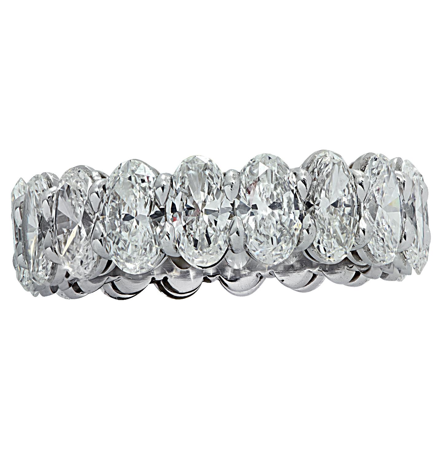 Exquisite Vivid Diamonds eternity band crafted by hand in Platinum, showcasing 18 stunning emerald cut diamonds weighing 4.96 carats total, D-F color, VVS-VS clarity. Each diamond is carefully selected, perfectly matched and set in a seamless sea of