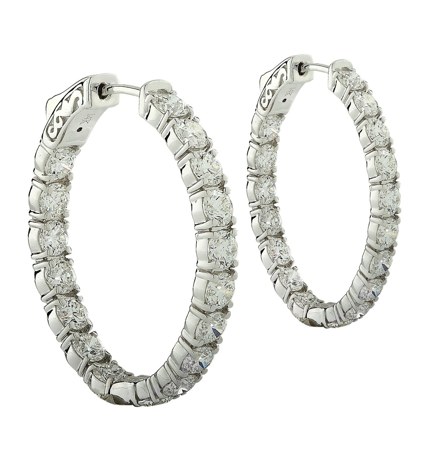 Spectacular Vivid Diamonds In/Out diamond hoop earrings crafted in white gold showcasing 34 round brilliant cut diamonds weighing 6.27 carats total, E-F color, VS-SI color. Each diamond is carefully selected, perfectly matched and set on the inside