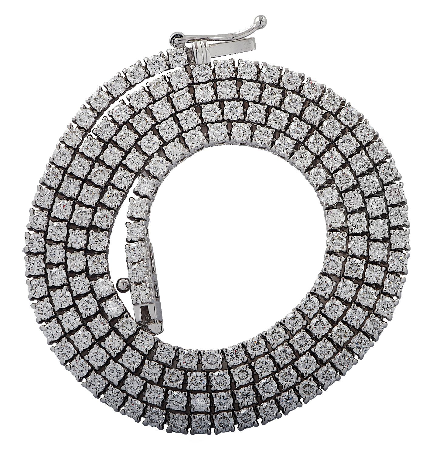 Exquisite Vivid Diamonds Straight Line diamond tennis necklace crafted in 18 karat White Gold, showcasing 150 round brilliant cut diamonds weighing 6.41 carats, G color, SI clarity. Each diamond was carefully selected, perfectly matched and set in a