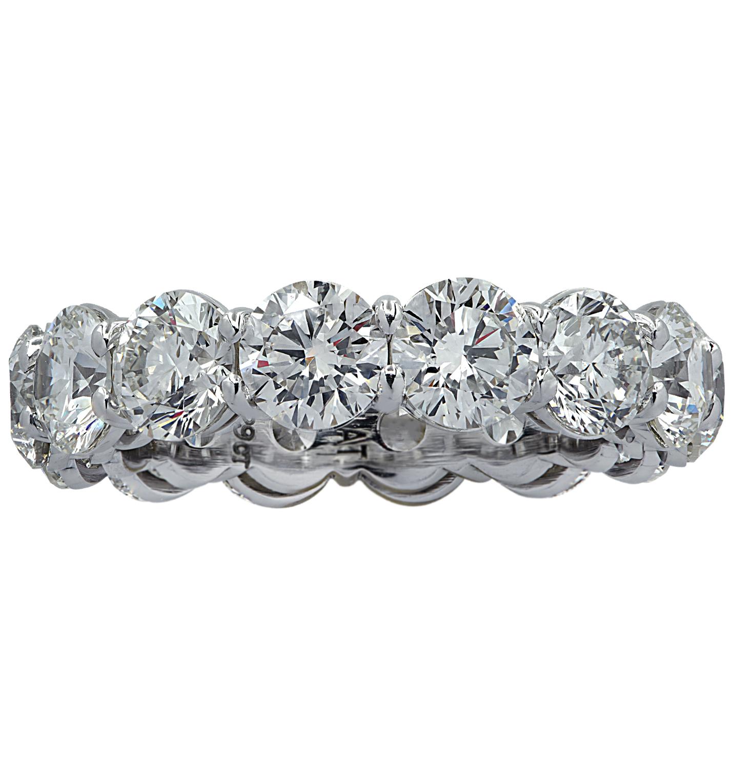 Exquisite Vivid Diamonds eternity band crafted in Platinum, showcasing 14 stunning round brilliant cut diamonds weighing 7.29 carats total, I-J color, VS-SI clarity. Each diamond was carefully selected, perfectly matched and set in a seamless sea of