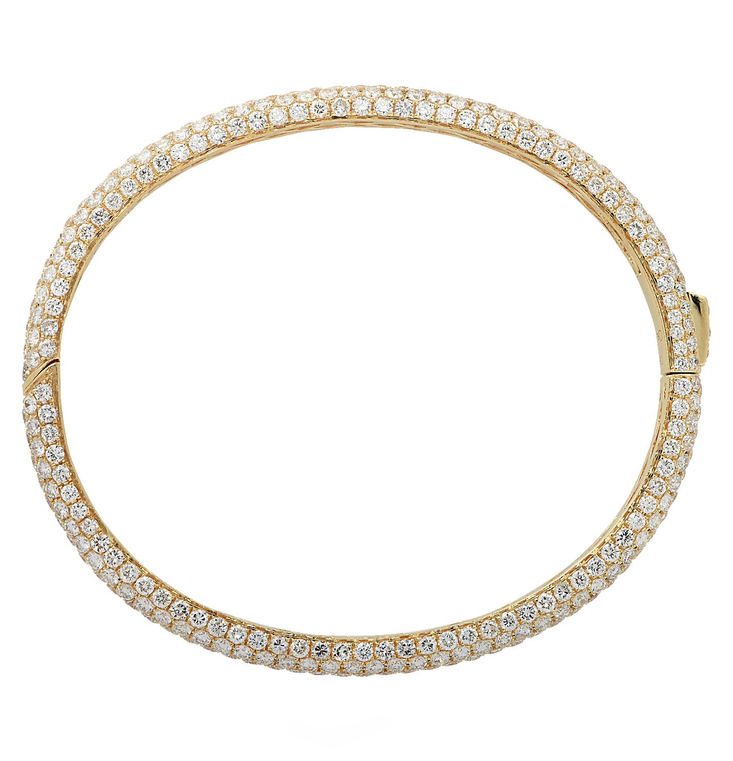 Sensational Vivid Diamonds bangle bracelet crafted in 18 karat yellow gold, featuring round brilliant cut diamonds weighing approximately 9.33 carats total, E-F color, VS-SI clarity. Five rows of collection diamonds, carefully selected and perfectly