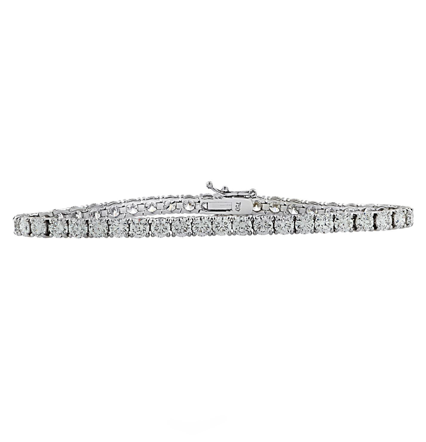Exquisite Vivid Diamonds diamond tennis bracelet crafted in 18 karat white gold, showcasing 45 stunning round brilliant cut diamonds weighing approximately 9.39 carats total, D-E color, VS-SI clarity. Each diamond is carefully selected, perfectly