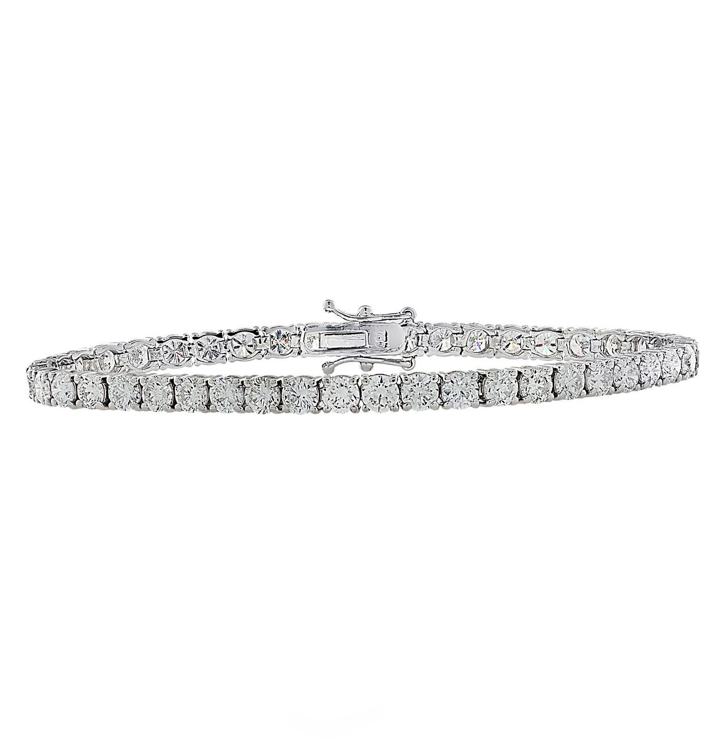 Exquisite Vivid Diamonds diamond tennis bracelet crafted in 18 karat white gold, showcasing 44 stunning round brilliant cut diamonds weighing approximately 9.8 carats total, G-H color, SI clarity. Each diamond is carefully selected, perfectly