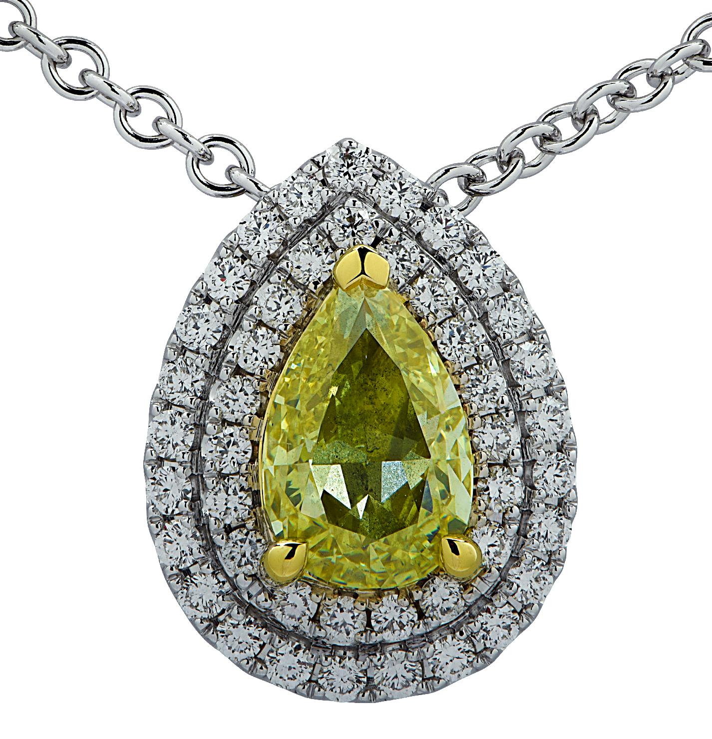 Stunning Vivid Diamonds necklace crafted in 18 karat gold, showcasing a GIA Certified Fancy Yellow Pear shape diamonds weighing 1.01 carats, and 44 round brilliant cut diamonds weighing 33 carats total, G color, VS-SI clarity. The yellow pear shape