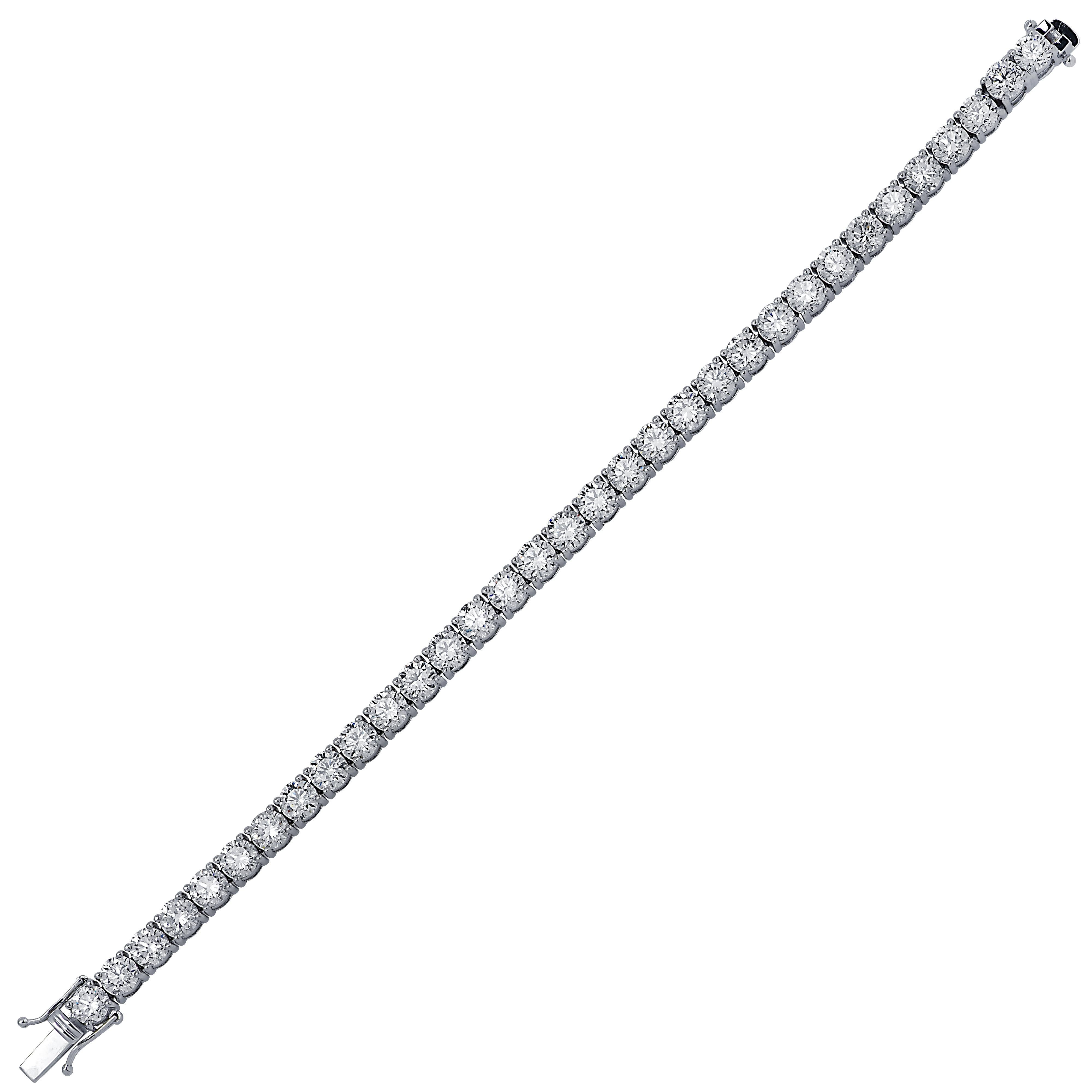 Exquisite diamond tennis bracelet crafted in platinum, showcasing 36 stunning GIA certified round brilliant cut diamonds weighing 14.40 carats total, G color, SI1-SI2 clarity. Each diamond is carefully selected, perfectly matched and set in a