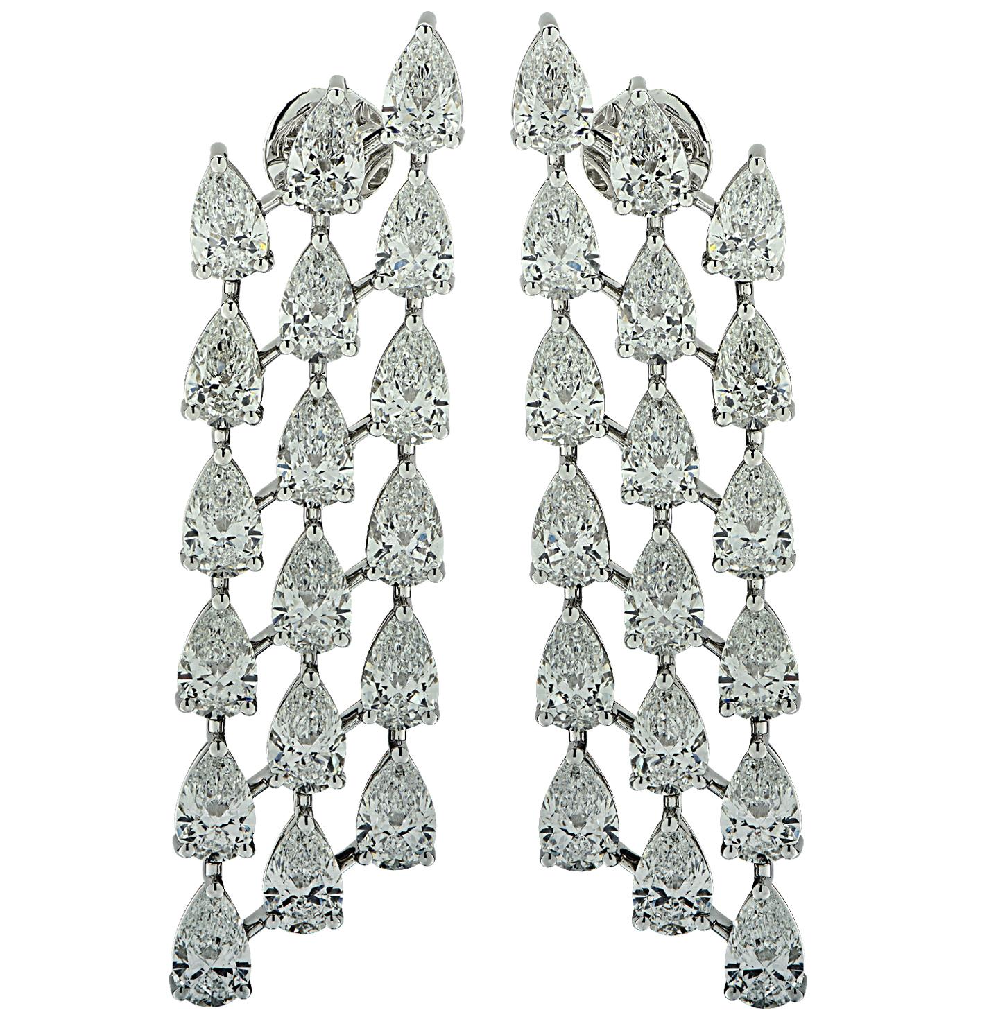 Sensational Vivid Diamonds Dangle Earrings finely crafted by hand in platinum, featuring 36 GIA Certified Pear shape diamonds weighing 14.50 carats total, D-F color, SI1 clarity. Each spectacular diamond was carefully selected, perfectly matched and