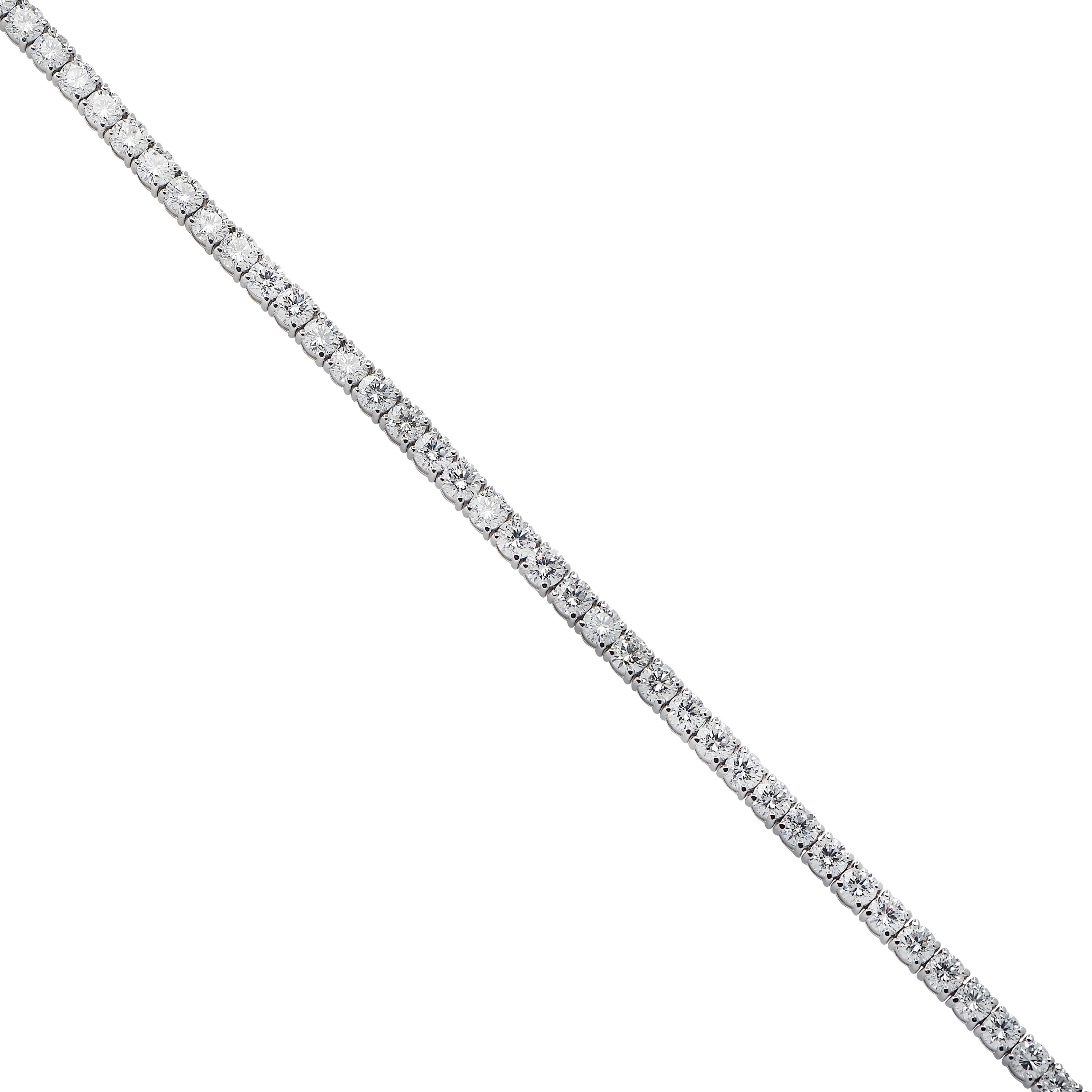 Exquisite diamond tennis bracelet crafted in platinum, showcasing 36 stunning GIA certified round brilliant cut diamonds weighing 14.57 carats total, J-K color, -VVS-VS clarity. Each diamond is carefully selected, perfectly matched and set in a