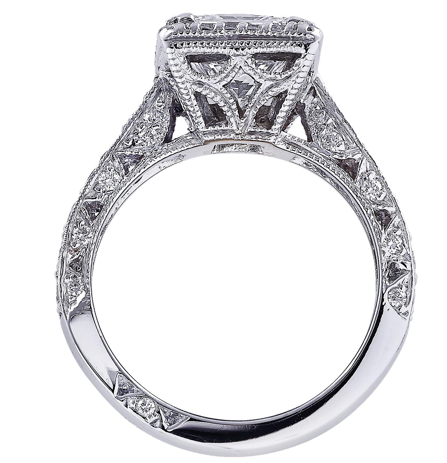 Sensational Vivid Diamonds halo engagement ring crafted in platinum showcasing an exquisite GIA Certified Princess Cut diamond weighing 2.04 carats, H color, VS1 clarity (GIA report # 15199124). The halo and band of this spectacular ring are adorned