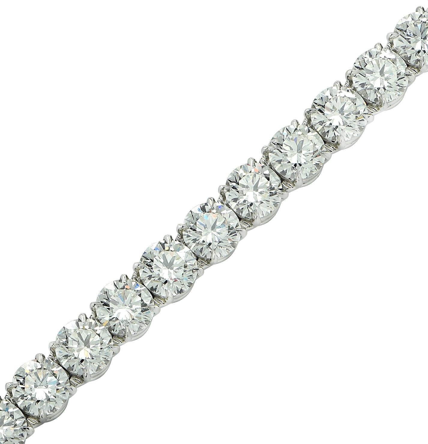 Spectacular bracelet hand crafted in platinum, featuring 26 sensational GIA certified round brilliant cut diamonds weighing 26.78 carats total, H color, VS2 clarity. Each GIA certified diamond was carefully selected, perfectly matched and set in an