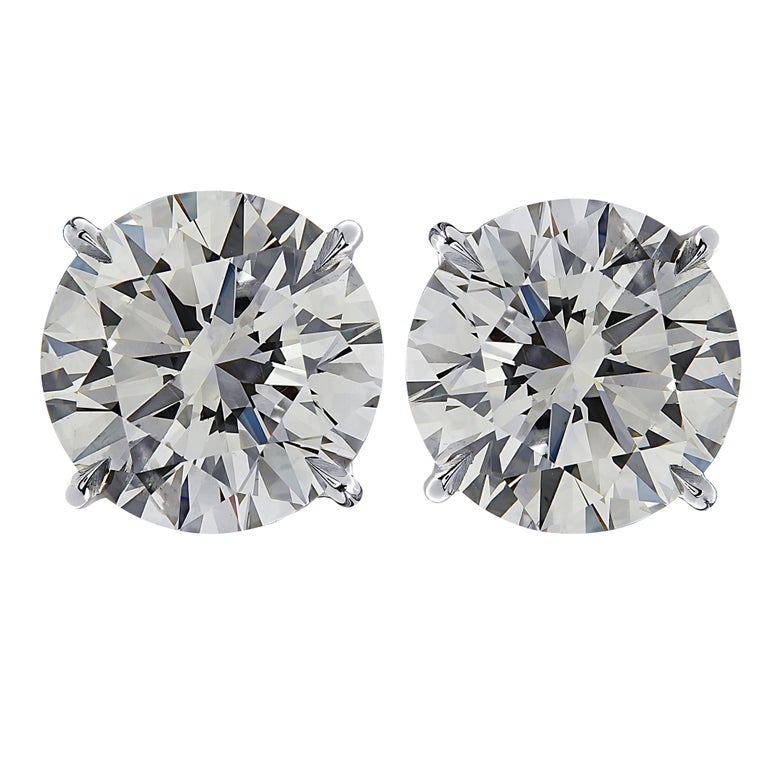 Round Cut Vivid Diamonds GIA Certified 4 Carat Diamond Solitaire Stud Earrings