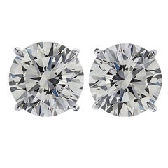 Vivid Diamonds GIA Certified 6.01 Carat Diamond Solitaire Stud Earrings
