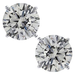 Used Vivid Diamonds GIA Certified 6.14 Carat Diamond Stud Earrings