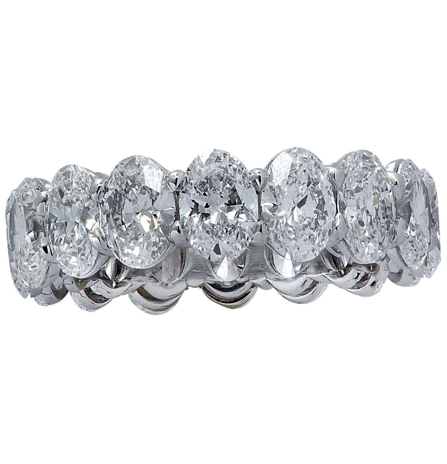 Exquisite Vivid Diamonds eternity band crafted by hand in Platinum, showcasing 16 stunning GIA Certified oval cut diamonds weighing 6.61 carats total, D-E color, VVS2-VS1 clarity. Each diamond is carefully selected, perfectly matched and set in a