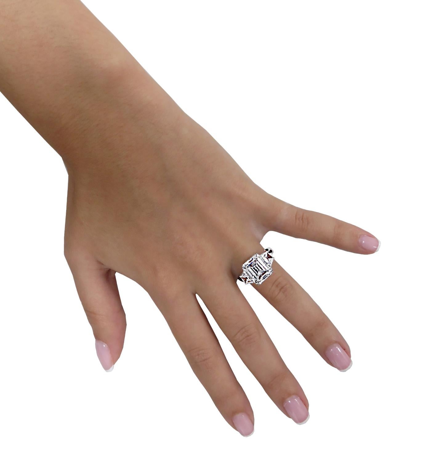 Modern Vivid Diamonds GIA Certified 7.01 Carat Emerald Cut Diamond Engagement Ring For Sale