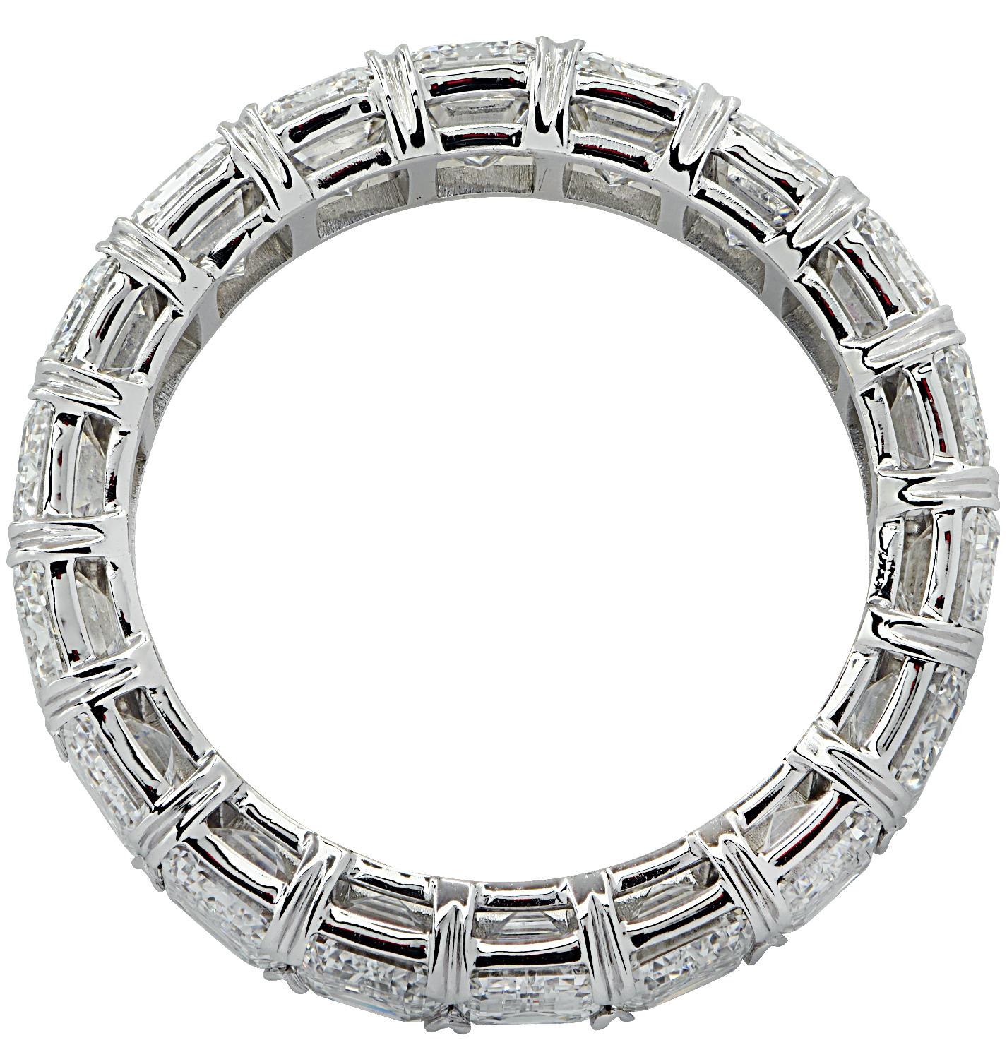 Exquisite Vivid Diamonds eternity band crafted in Platinum, showcasing 19 stunning GIA Certified emerald cut diamonds weighing 7.72 carats total, D-G color, VVS1-VS1 clarity. Each diamond was carefully selected, perfectly matched, and set in a