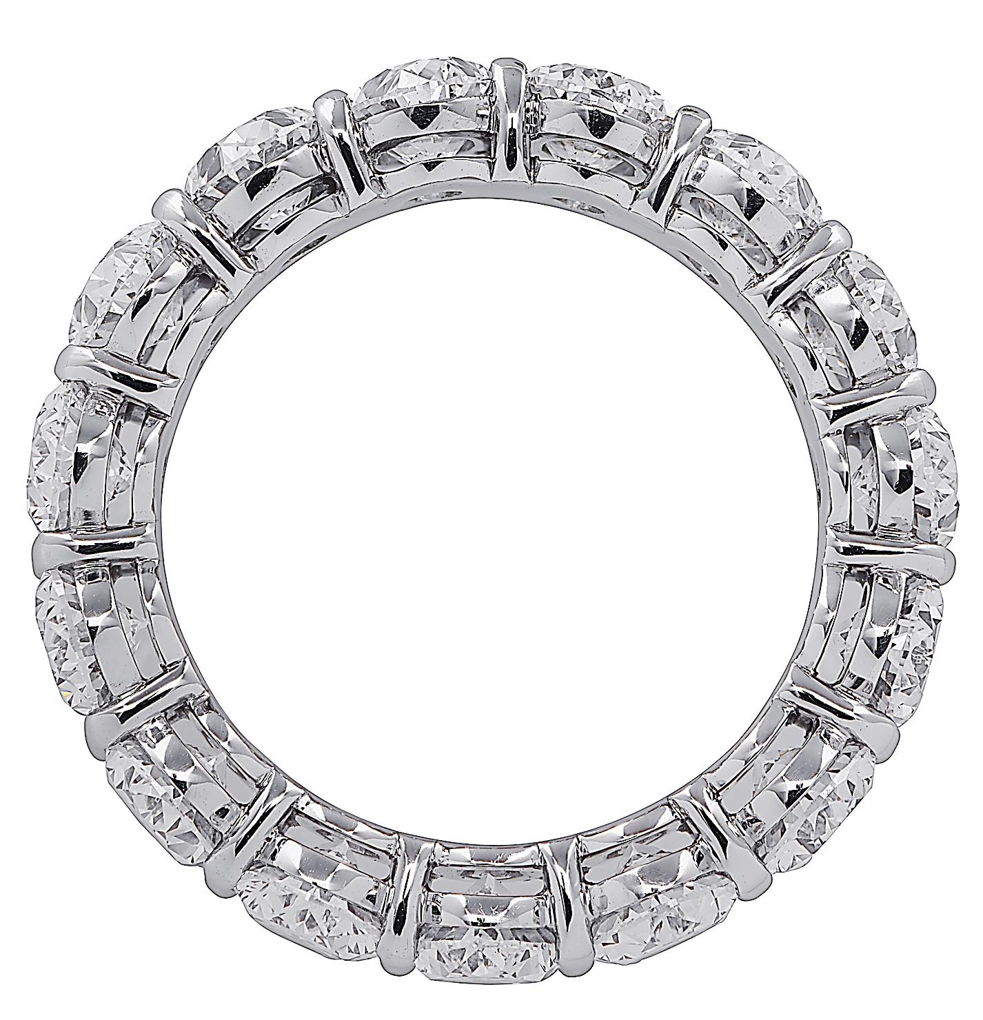 Exquisite eternity band crafted by hand in Platinum, showcasing 15 stunning GIA Certified oval cut diamonds weighing 7.90 carats total, D-F color, VVS1-VS2 clarity. Each diamond is carefully selected, perfectly matched and set in a seamless sea of