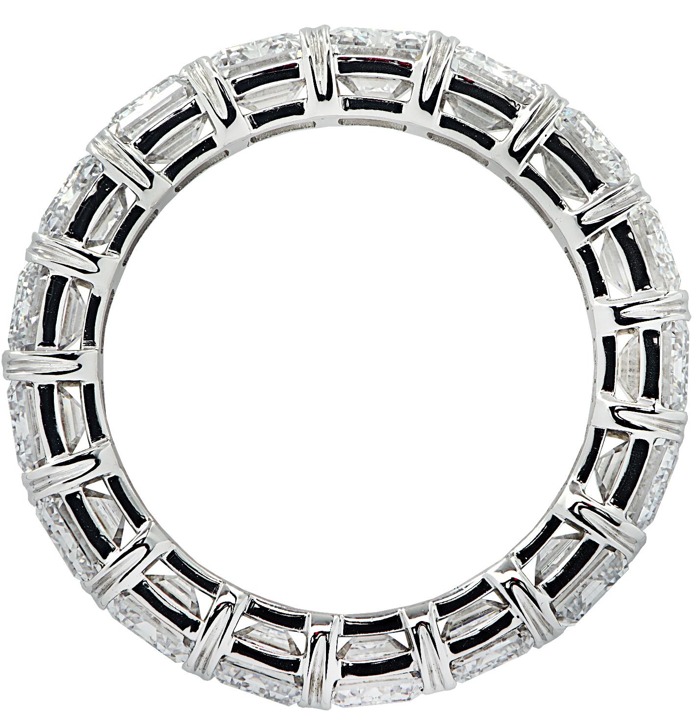 Exquisite Vivid Diamonds eternity band crafted in Platinum, showcasing 17 stunning GIA Certified emerald cut diamonds weighing 9.47 carats total, D color, VVS1-VVS2 clarity. Each diamond was carefully selected, perfectly matched, and set in a