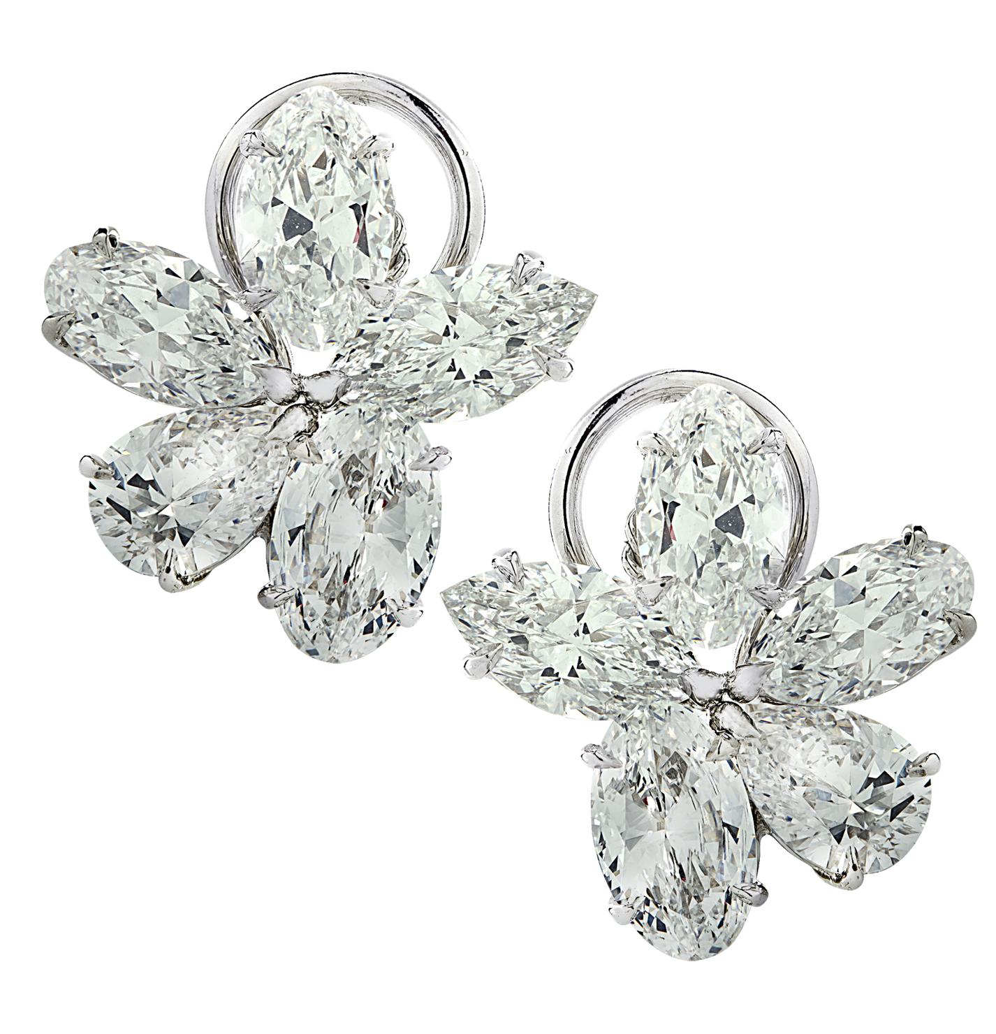 Spectacular cluster earrings featuring 10 Marquise and Pear Shape Diamonds weighing 9.91cts, ranging from D-F in color and VVS2-SI2 in clarity. All diamonds are accompanied by GIA Reports.

Our pieces are all accompanied by an appraisal performed by