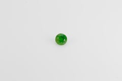 Vivid emerald green faceted demantoid garnet, 0.475 ct