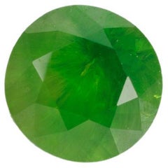 Vivid emerald green faceted demantoid garnet, 0.475 ct