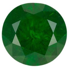 Vivid emerald green faceted demantoid garnet, 0.56 ct
