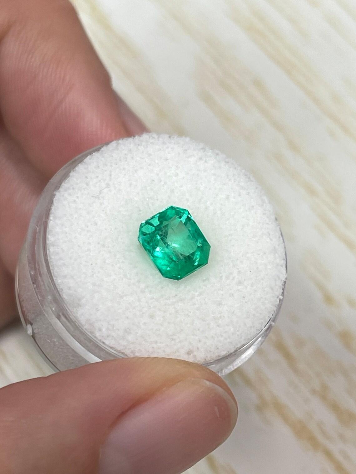 Vivid Glowing Green 1.96 Carat Emerald Cut Muzo Colombian Emerald Gem - May In New Condition For Sale In Jupiter, FL