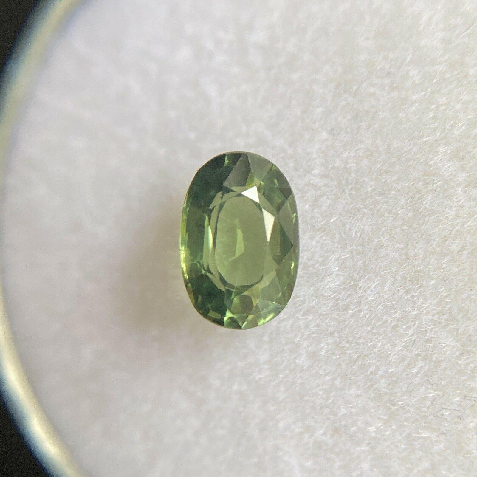 Vivid Green 0.88ct Australian Sapphire Oval Cut Loose Rare Gem 6.7 x 4.5mm

Natural Australian Green Sapphire Gemstone. 
0.88 Carat with a beautiful green colour and an excellent oval cut. Also has excellent clarity, very clean stone, practically